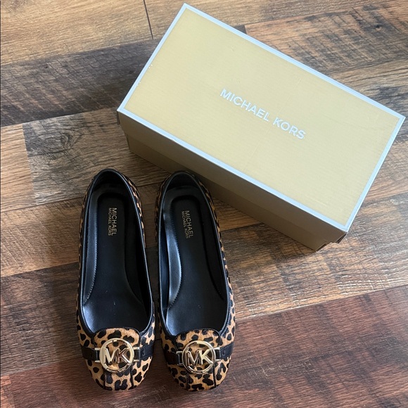 Michael Kors Shoes - Michael Kors Animal Print Flats with Gold Logo